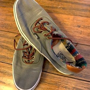 Nice set of Vans size 11 mens shoes. Really cool design.